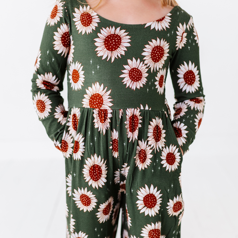 
                      
                        Sunflower wide-leg romper by Kiki and Lulu.
                      
                    