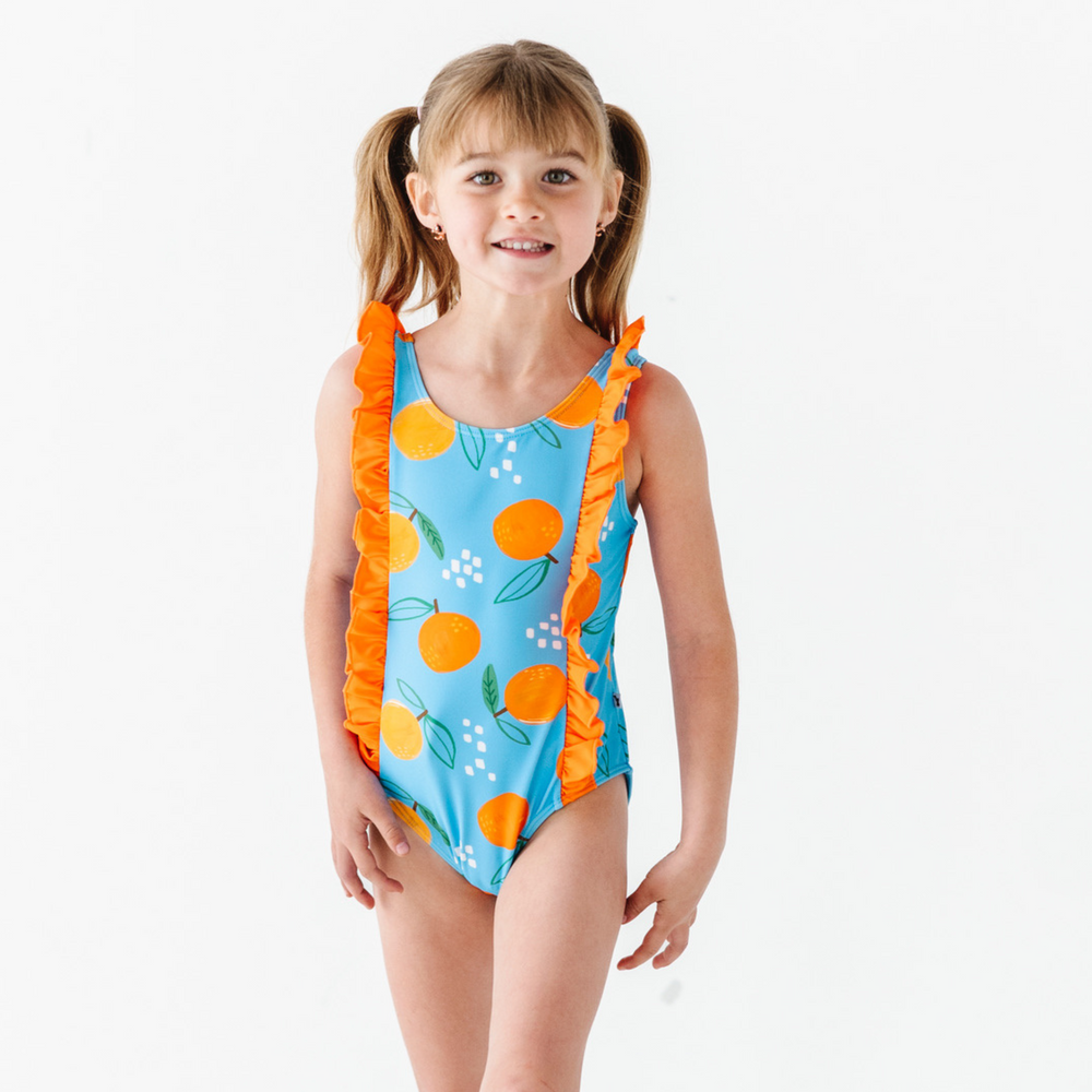
                      
                        Orange You Glad To See Me Swimsuit With Ruffle
                      
                    